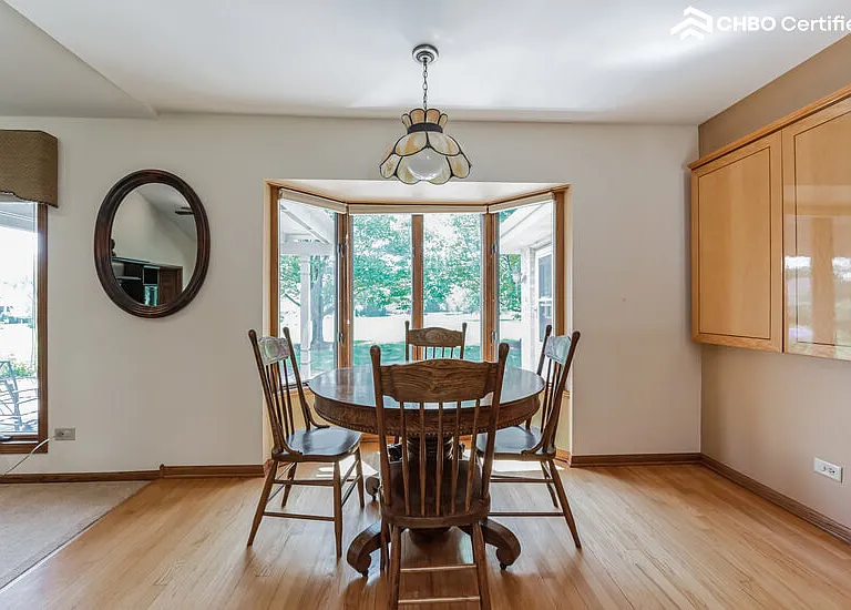Eat in Kitchen table coupled w/ executive whiteboard cabinet
