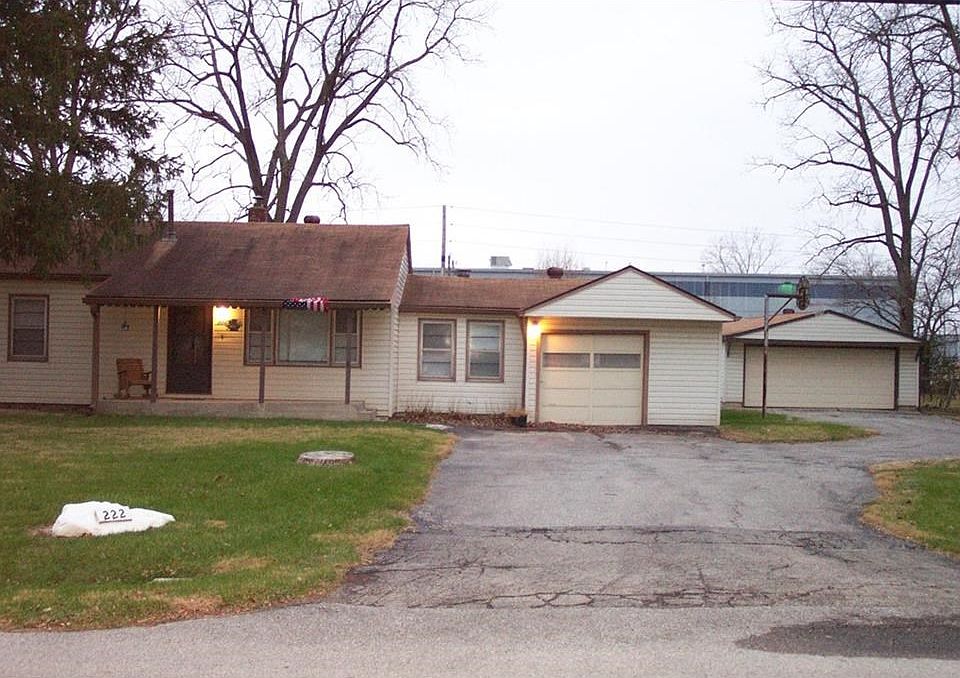 View of front of the home with a 1 car attached garage and the 2 car oversized detached garage!