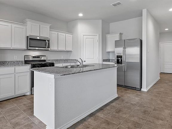 Kitchen - All Home and community information, including pricing, included features, terms, availability and amenities, are subject to change at any time without notice or obligation. All Drawings, pictures, photographs, video, square footages, floor plans, elevations, features, colors and sizes are approximate for illustration purposes only and will vary from the homes as built.