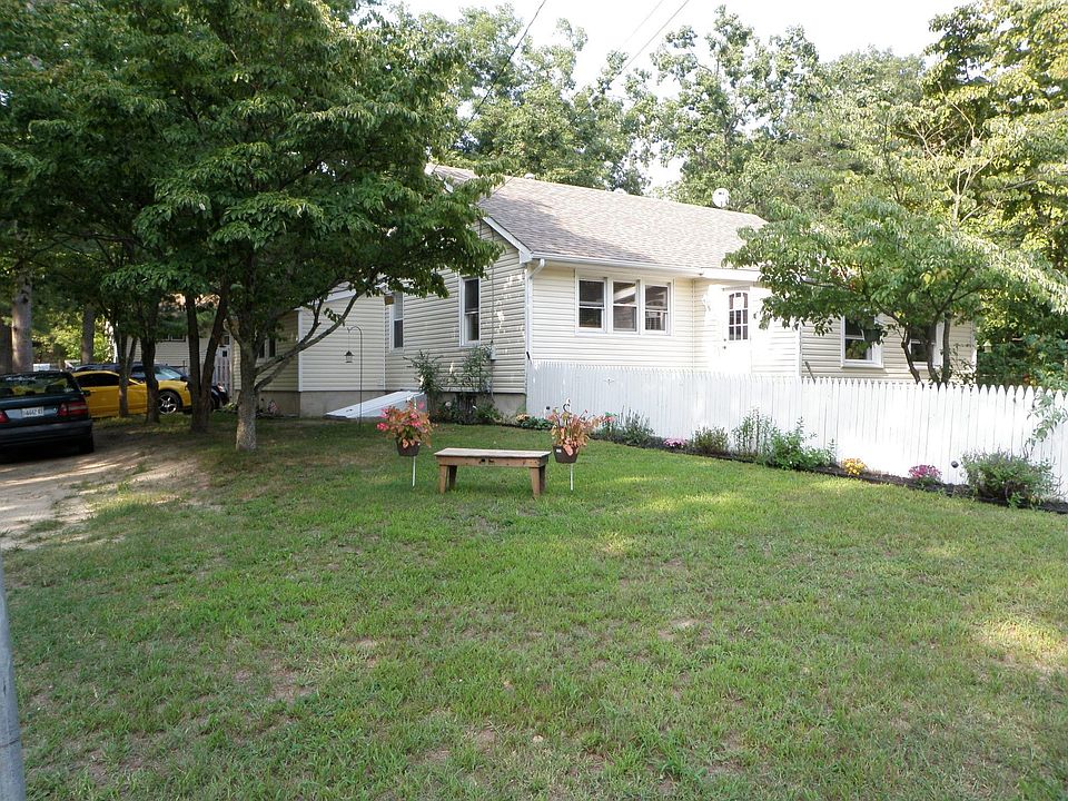 Front yard and side view of the house