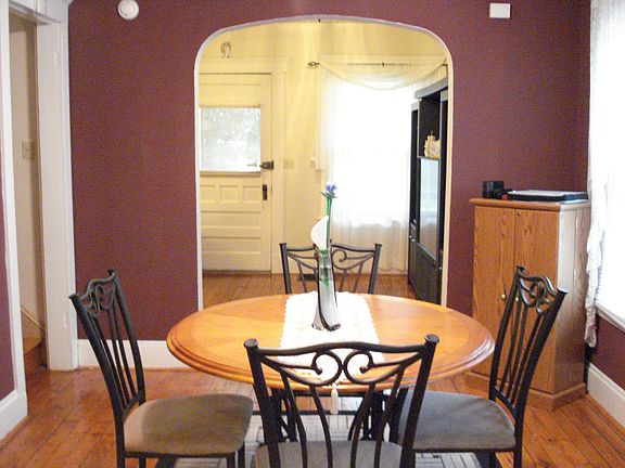 Large formal dining with wood floor!