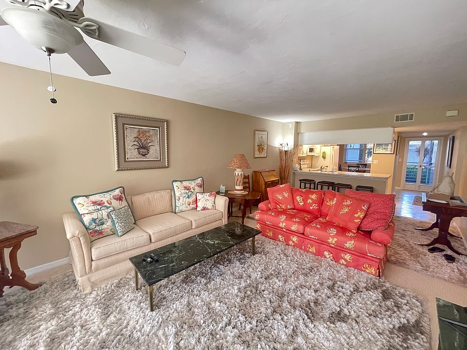 Living Room looking toward bar & kitchen