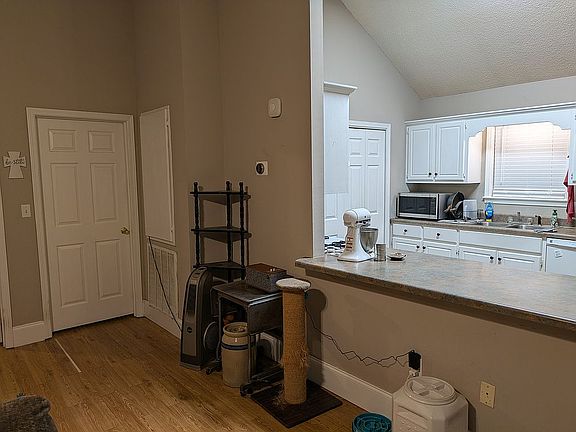 Living area to kitchen