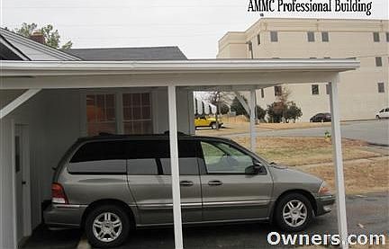 Attached carport has a secure entrance