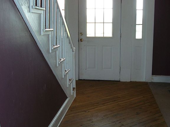 Foyer with Original Hardwood Flooring