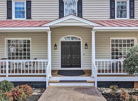 Inviting front and wrap around porch!