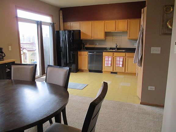 KITHEN AND ADJACENT CONVENIENT DINING AREA