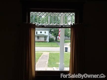 Front window - leaded glass
						:
						original leaded glass front window gives this old home character and charm,