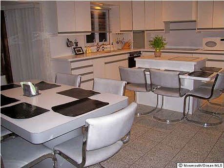 Huge custom kitchen w/room to seat many guests