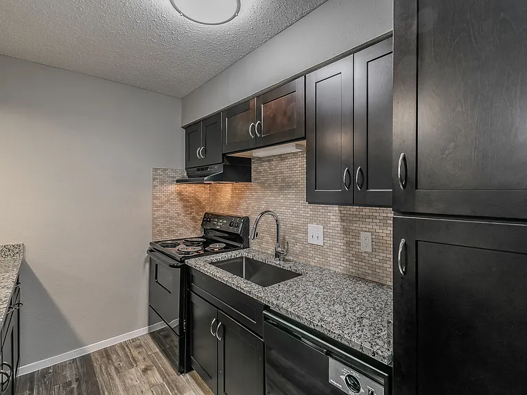 Elegant kitchen finishes blend warmth and modern design.