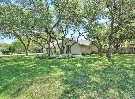 Really large lot, over 1/3 acre. Full of freshly trimmed oaks.
