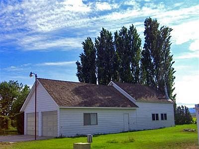 This shows the side view of the home, plus the added on room. There's a large backyard, & lots of ro