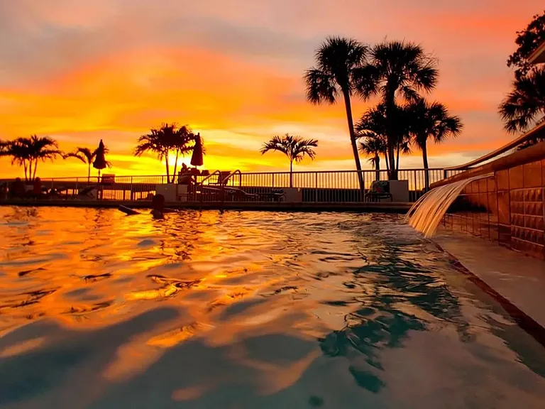 Enjoy gorgeous Florida sunsets from the waters of our resort-style pool.