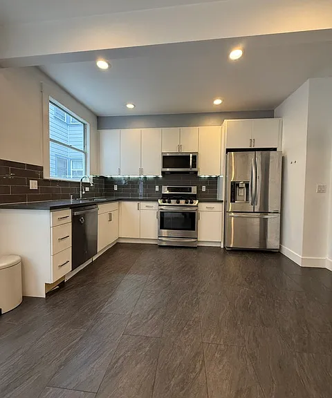 Large remodeled kitchen with dining area