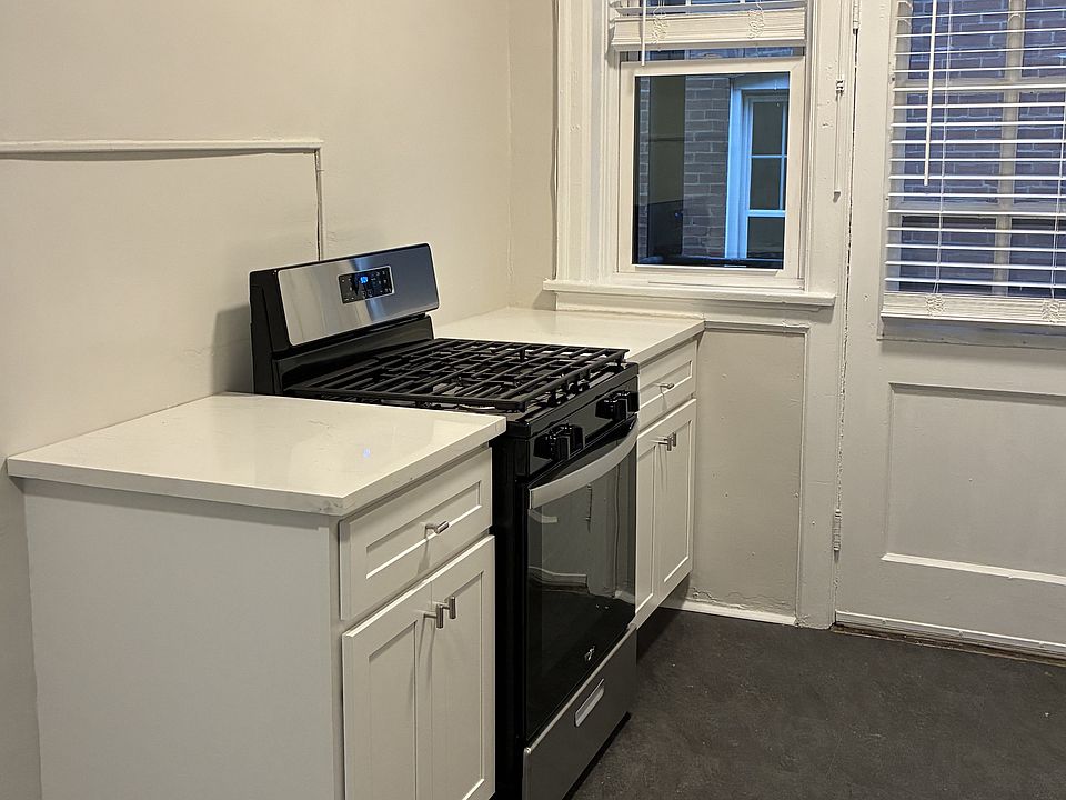 Remodeled kitchen with stainless steel appliances.