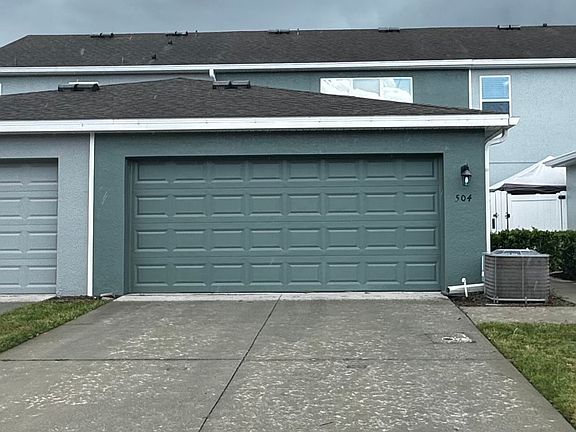 rear of townhouse, 2 car garage