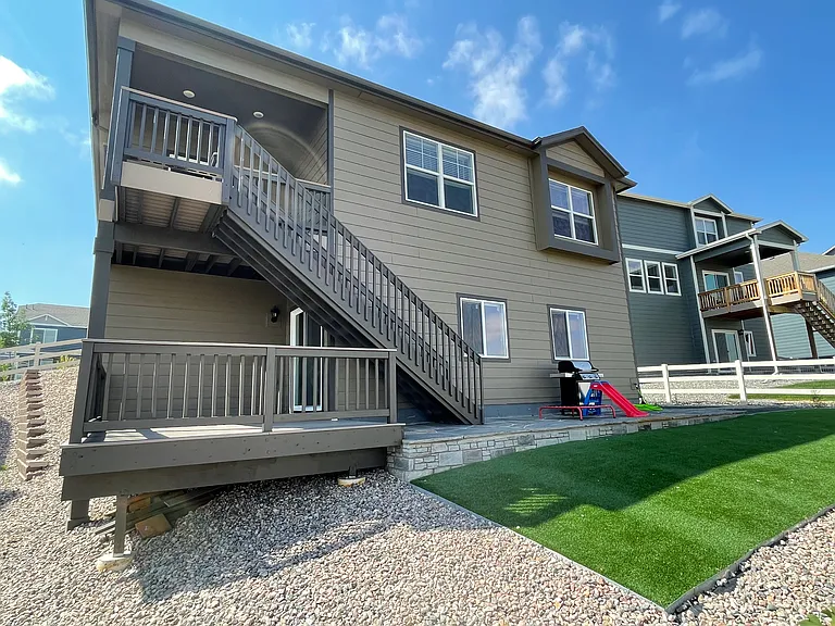 Artificial turf, maintenance free backyard, patio and huge lower deck