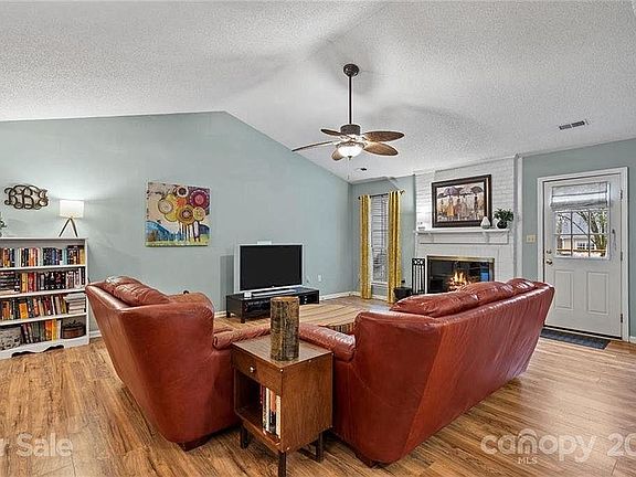Great Room, Vaulted Ceiling, Wood Burning Fireplace, Door to Deck
