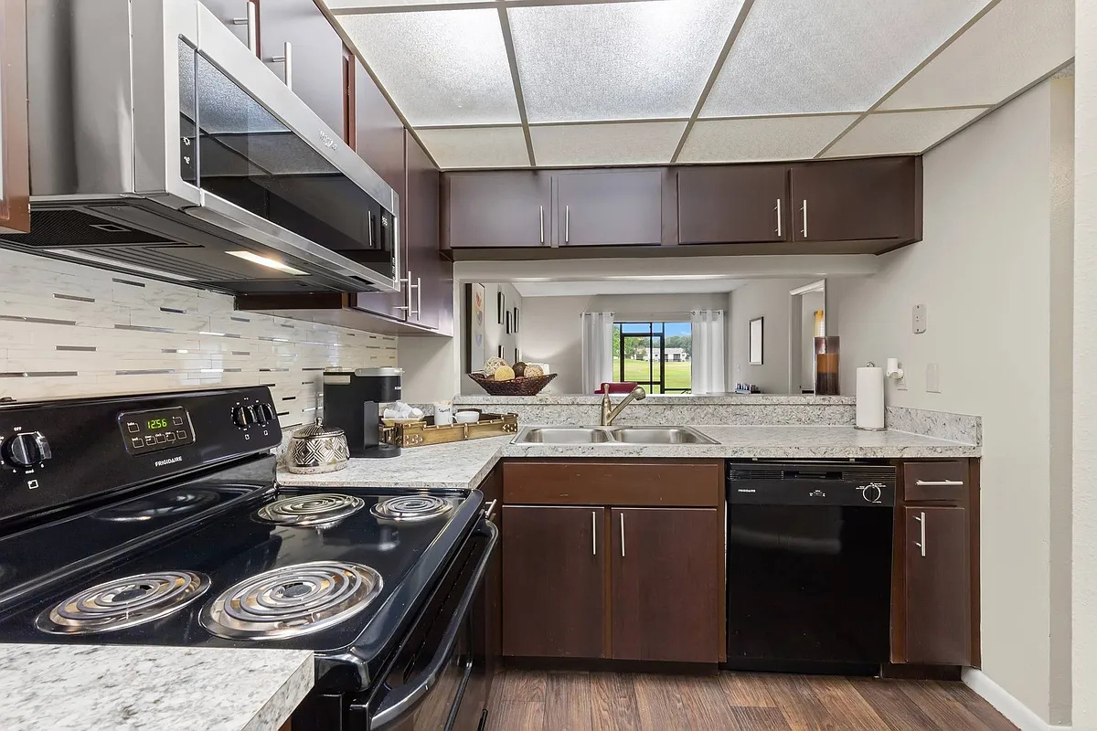 Kitchen with Built-In Microwave - The Loop at Wedgewood