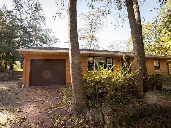 Front of house with 1 car attached garage