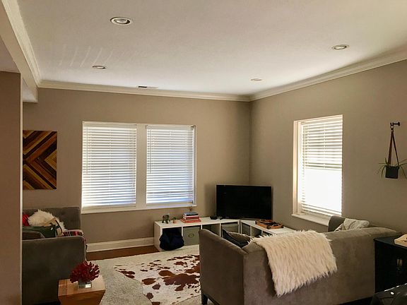 Living room off of kitchen, plenty of natural light!