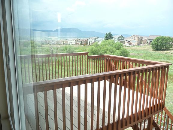 Back upper Deck with open area view & mountains