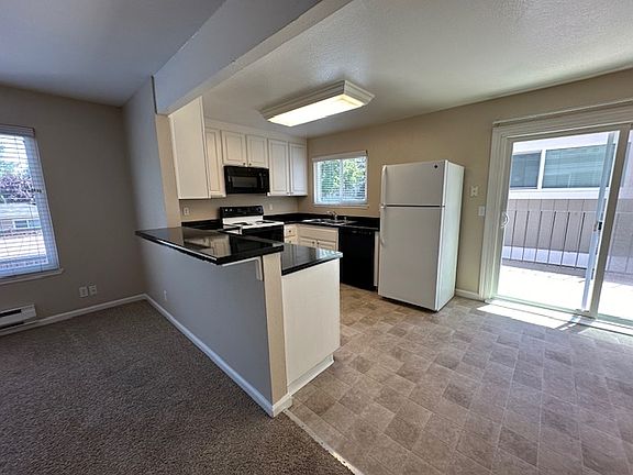 Deck off of dining area - close to kitchen for BBQ!