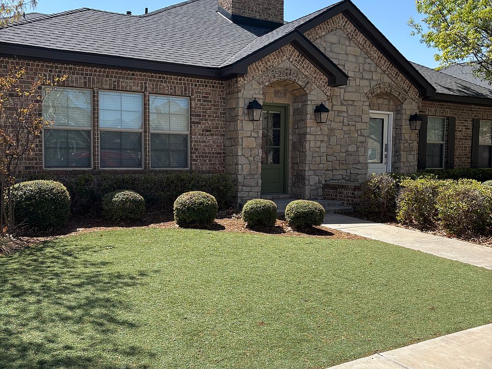 Front yard and entrance. Lawn maintained by landlord.