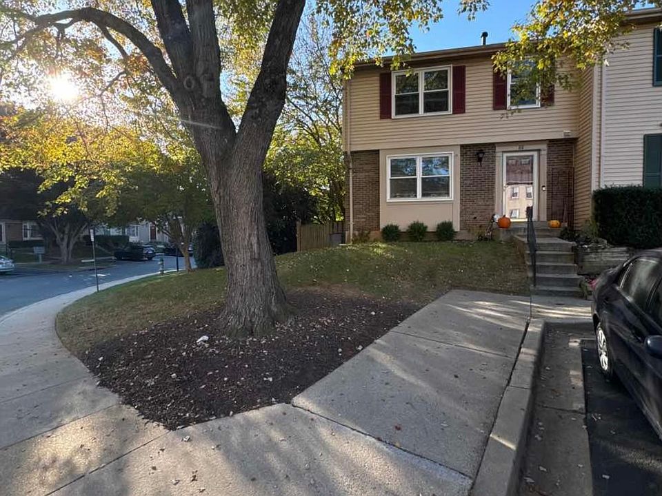 End unit fully fenced back yard with two assigned parking spots right in front of home