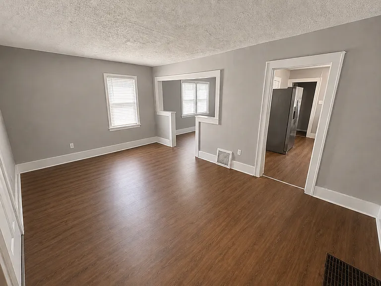 Front living room, looks into dining room and kitchen