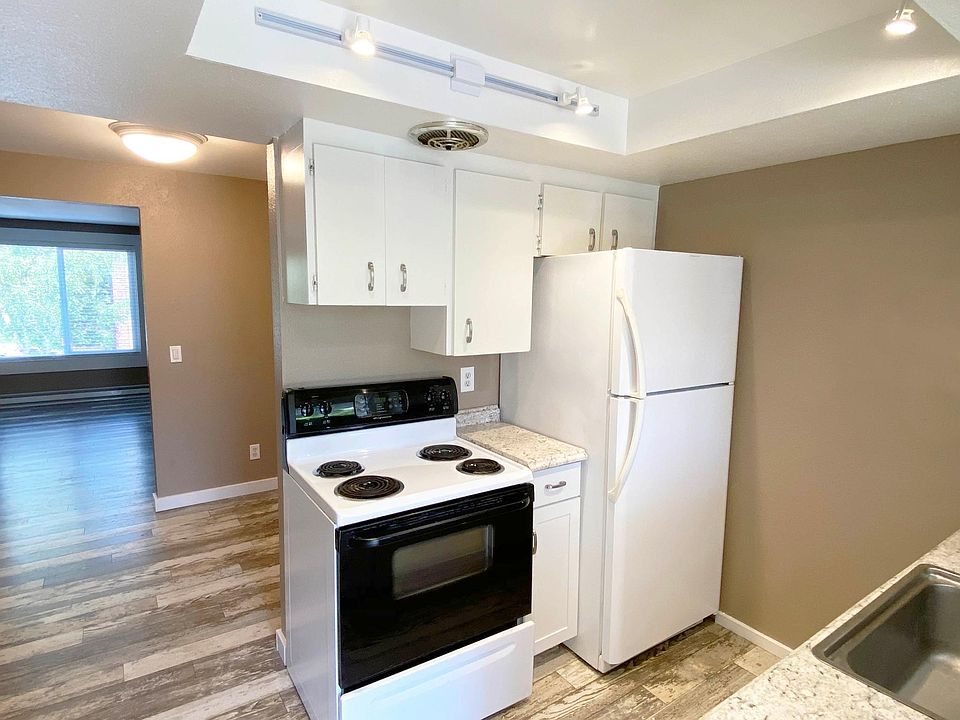 Full-Sized Range and Refrigerator.