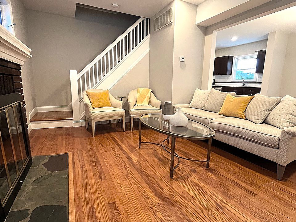 Living room with decorative fireplace