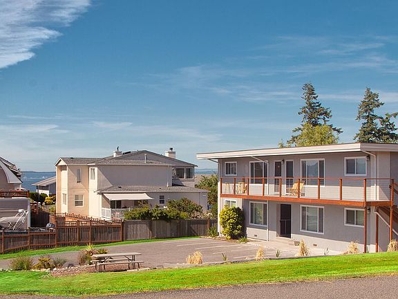 Mid Century 4plex in quiet residential neighborhood with views of the Puget Sound and ferry.