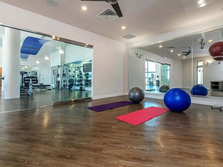 Stretch, breathe, or try something new in the yoga studio, where space and exercise balls give you endless ways to move.
