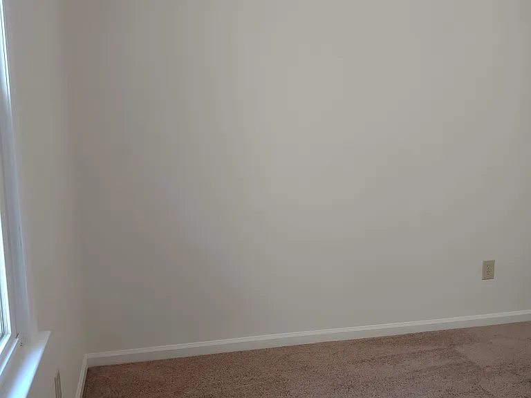 This photo has not been altered in any way: no edits or filters have been applied to try to deceive the viewer by having the room appear larger or brighter than it actually is.