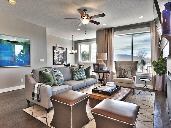 This is another view of the second floor living area, gorgeously appointed and furnished. The large window looks out onto your own private deck.