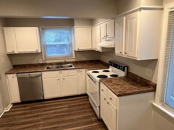kitchen with new cabinets. Lessor provides range, fridge and dishwasher