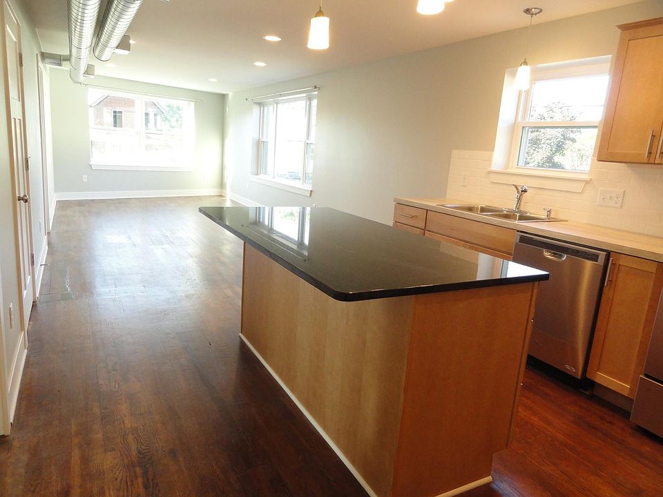 Kitchen with large island and granite counter