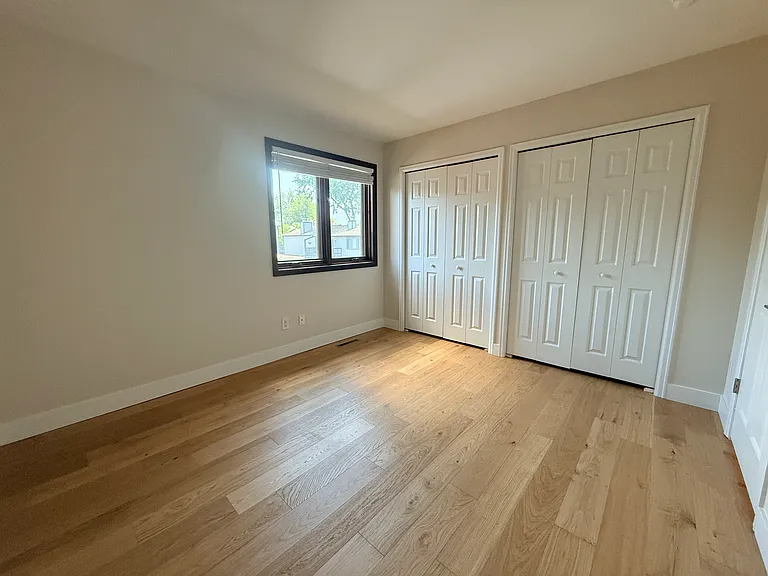 Upper bedroom with seasonal Flatirons views