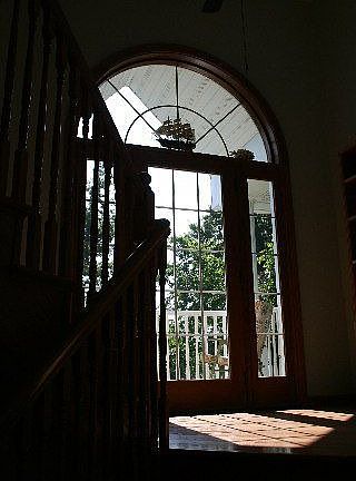 Entry has large single door  opening to landing