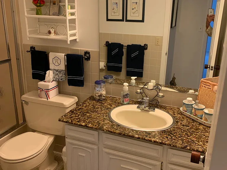 Guest bathroom down hall from guest bedroom