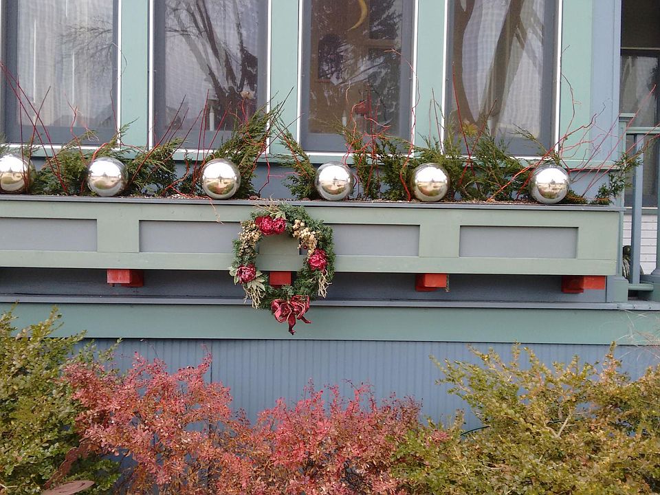 Portion of front of duplex taken during a holiday.