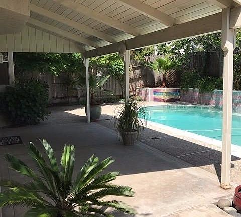 The covered patio offers lots of space for outdoor dining or relaxing...