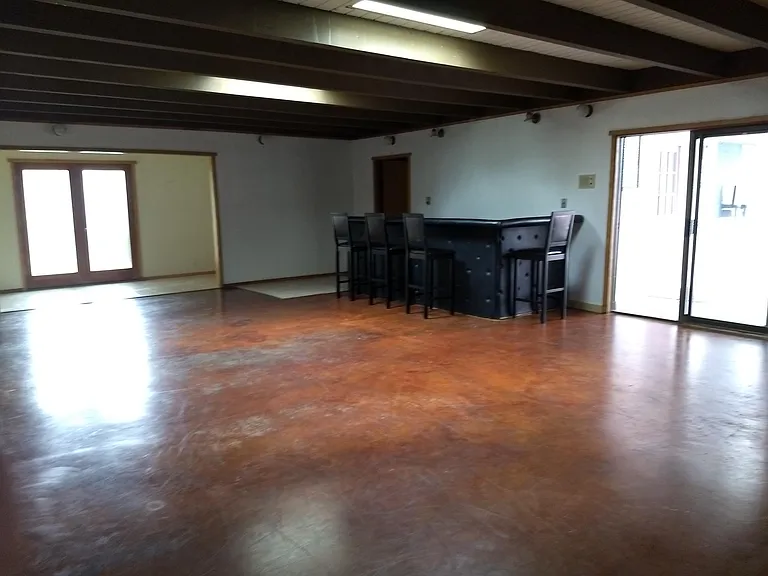 recreation room with two access doors