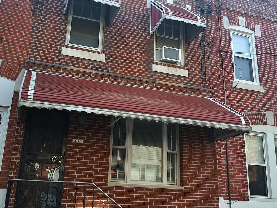 House facade with small terrace