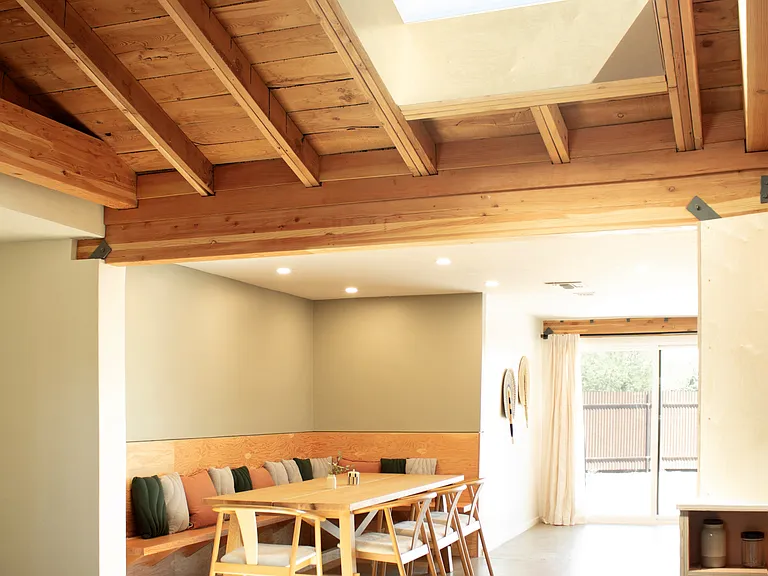 Dining area with skylight and seating for large groups.