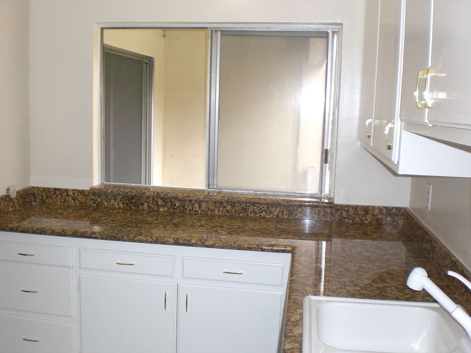 1st image of 5674 Windsor Way Unit 209