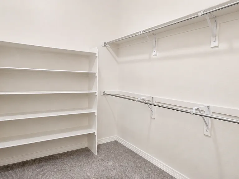 Primary Walk-In Closet (Right)