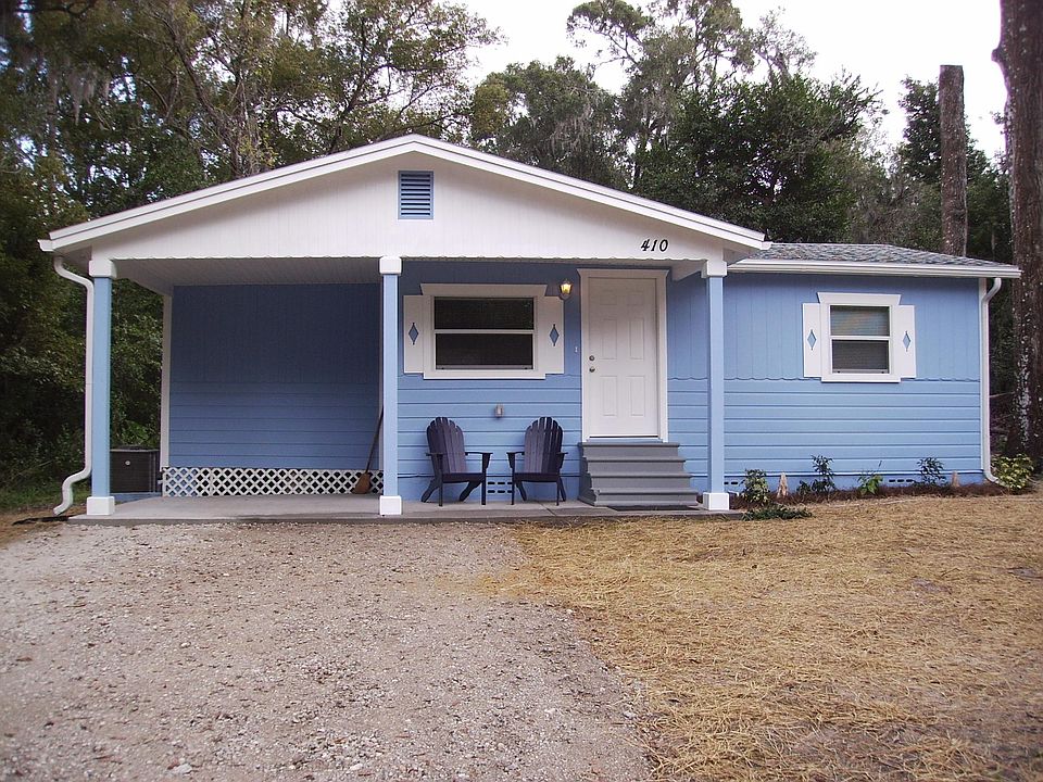 Front of house. Crushed concrete driveway, parking for 2,
