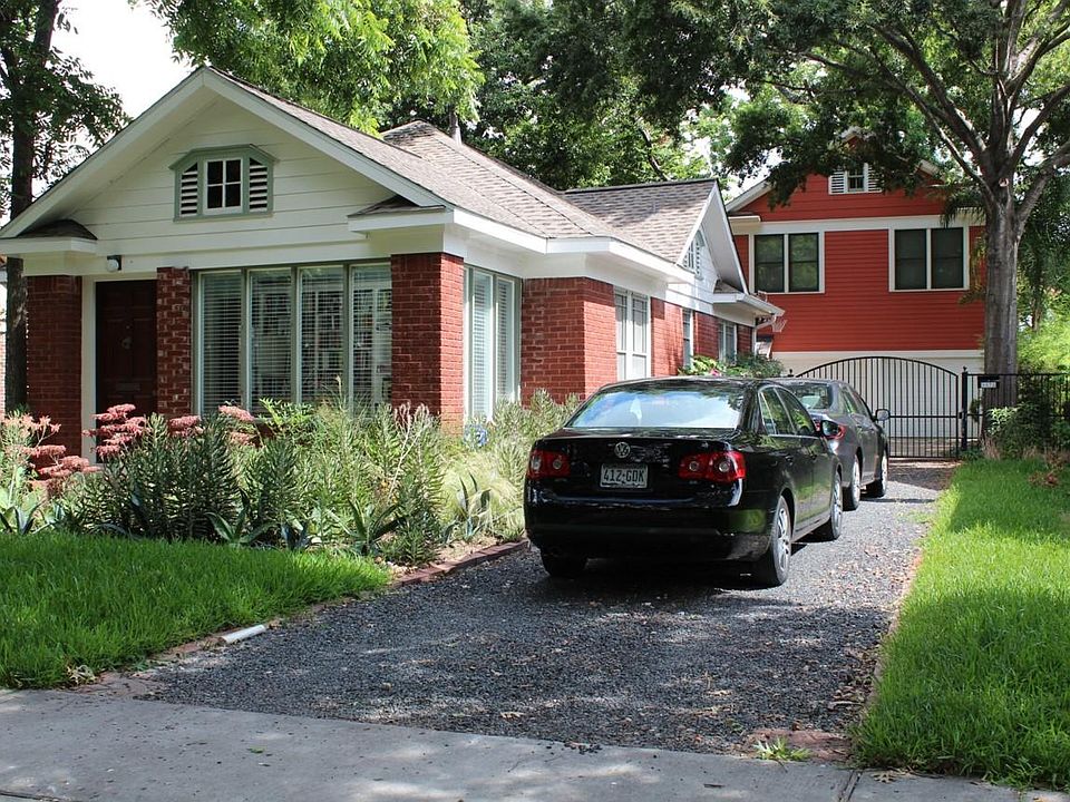 Garage apartment is in the background looking north.